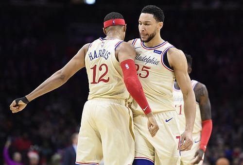 Tobias Harris chest bumps Ben Simmons in a game against the Milwaukee Bucks last season.