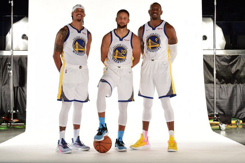Stephen Curry (middle) and the Golden State Warriors at Media Day 2021