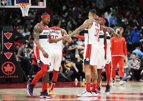 Bradley Beal #3 and Kyle Kuzma #33 of the Washington Wizards celebrate