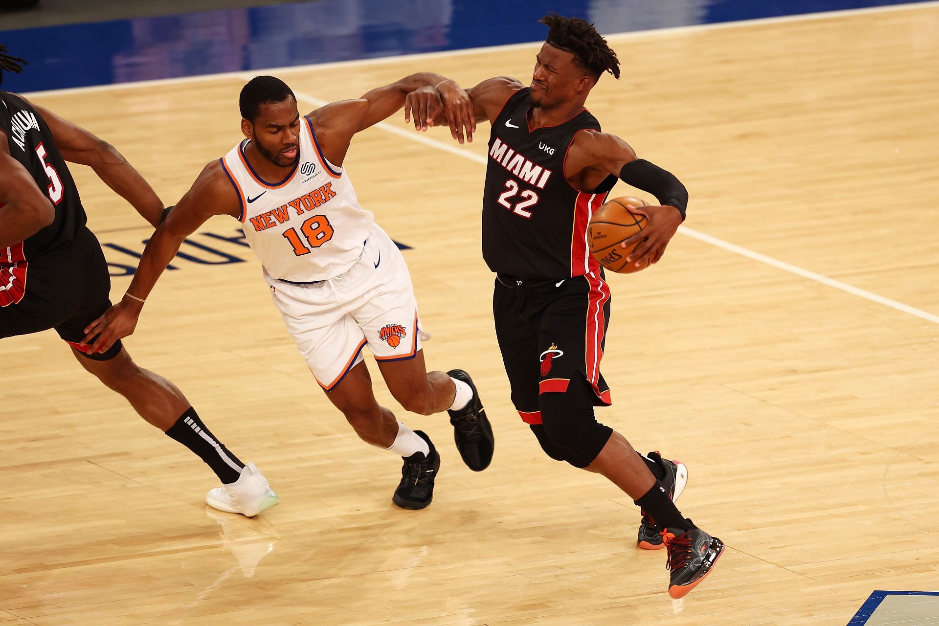 Jimmy Butler driving to the basket against the New York Knicks