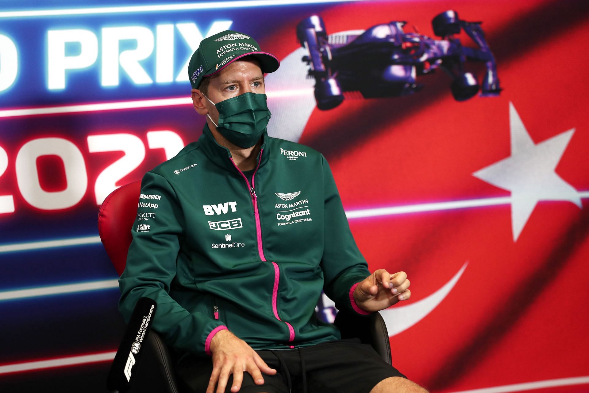 Sebastian Vettel of Aston Martin F1 Team talks in the Drivers Press Conference during previews ahead of the 2021 Turkish Grand Prix at Intercity Istanbul Park in Turkey. (Photo by Sedat Suna - Pool/Getty Images)
