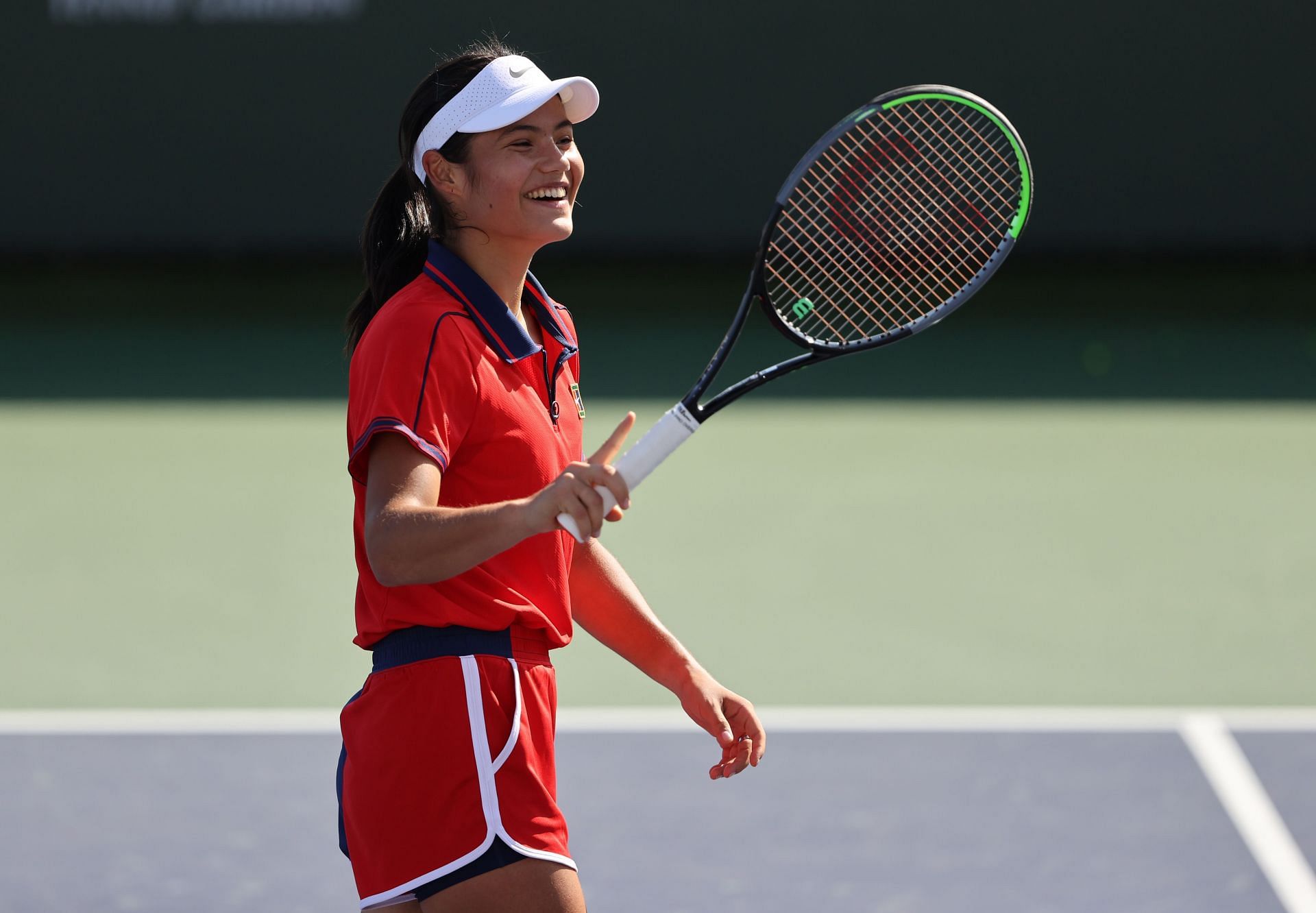 Emma Raducanu hitting the practice courts in Indian Wells.