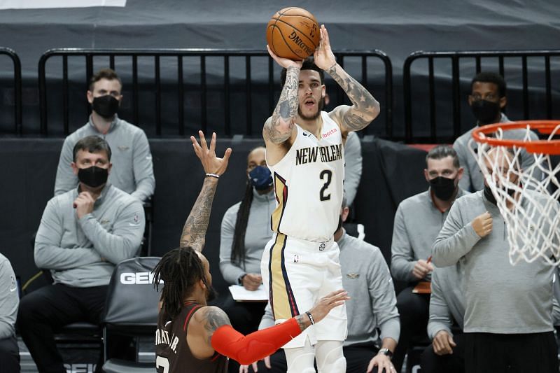 Lonzo Ball #2 of the New Orleans Pelicans attempts a three point basket against the Portland Trail Blazers during the first quarter at Moda Center on March 18, 2021 in Portland, Oregon.