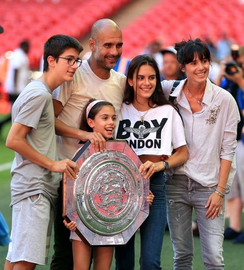 Pep Guardiola, Maria Guardiola and Cristina Serra, along with family. (Image via PA)