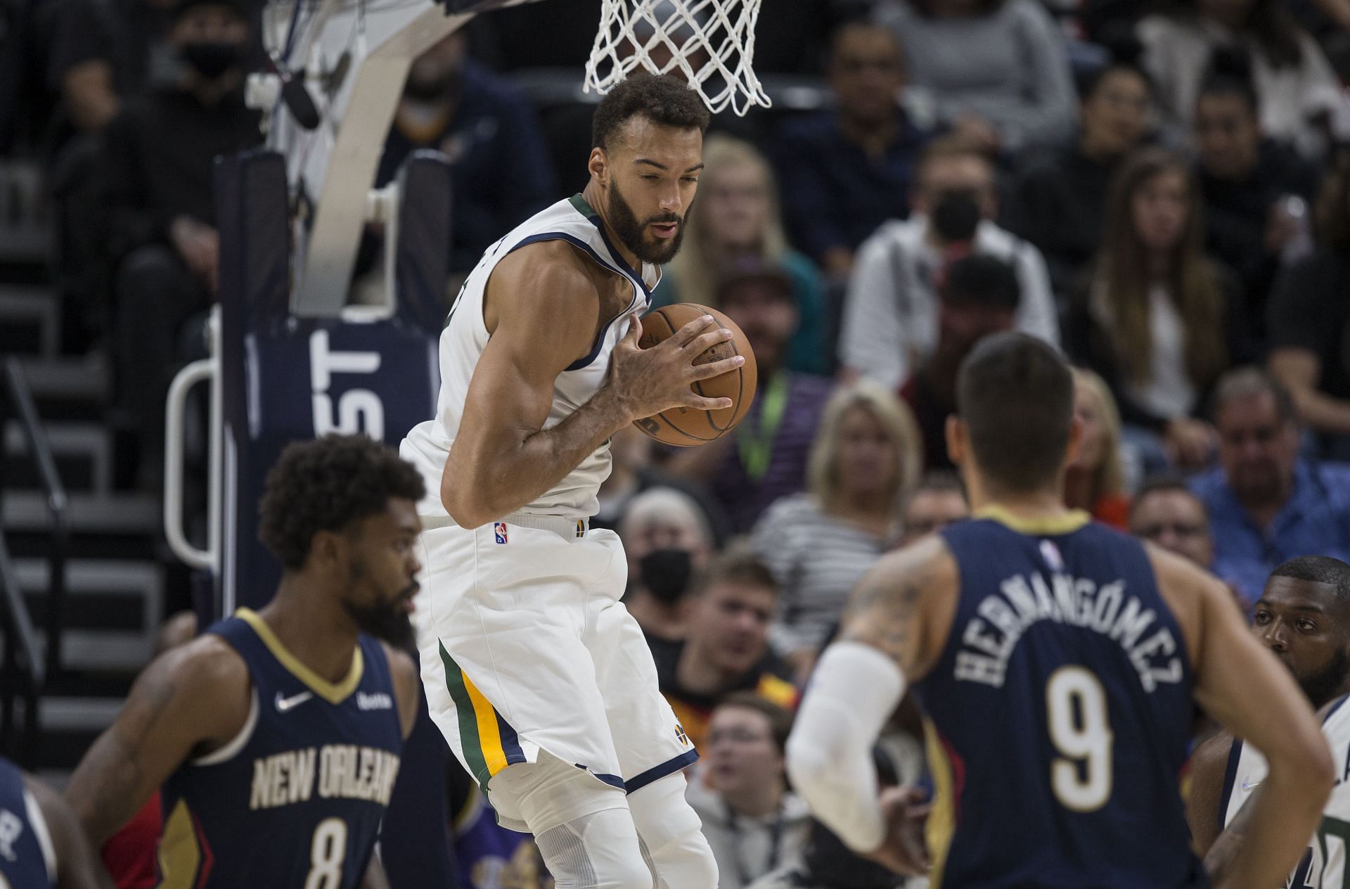 Rudy Gobert #27 of the Utah Jazz grabs a rebound during the first half of their game against the New Orleans Pelicans on October 11, 2021 at the Vivint Smart Home Arena in Salt Lake City, Utah.