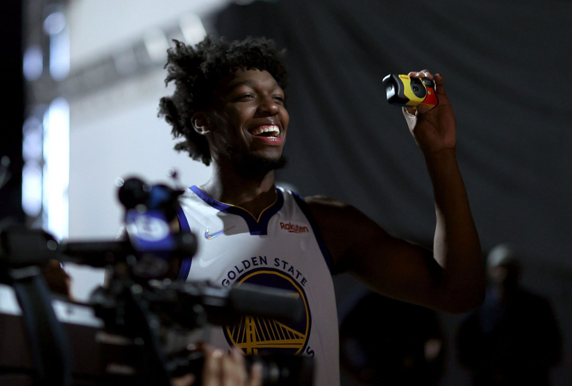 James Wiseman #33 of the Golden State Warriors takes a picture with a disposal camera during the Golden State Warriors Media Day at Chase Center on September 27, 2021 in San Francisco, California.