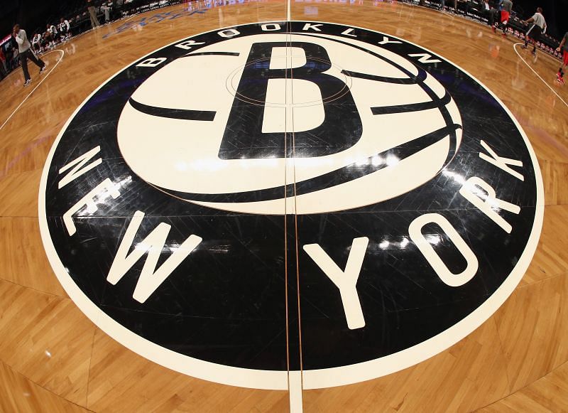 The Brooklyn Nets logo adorns center court.