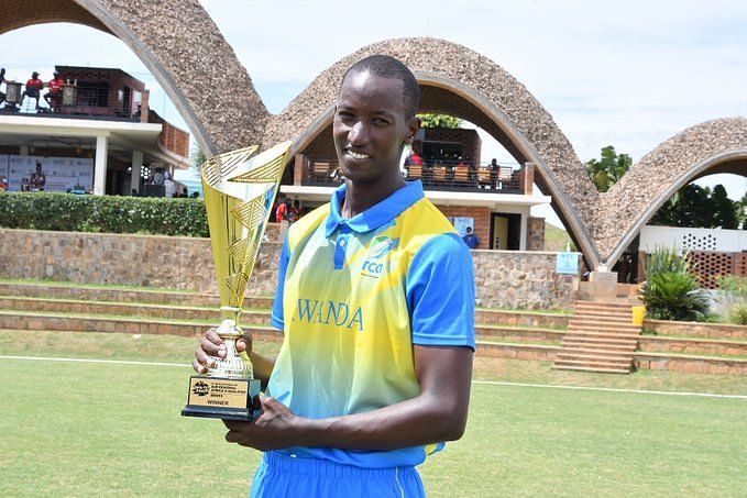 Rwanda&#039;s captain poses with the trophy. (Image Credits: Rwanda Cricket Association Twitter)