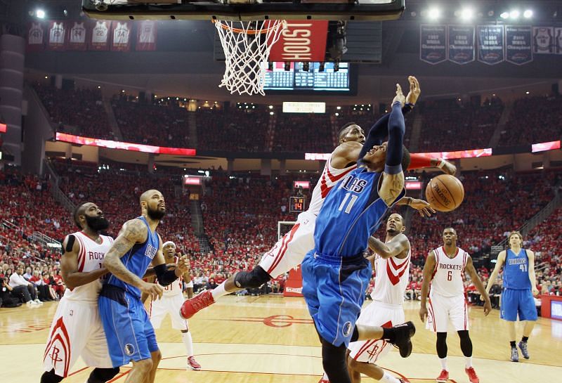 Dwight Howard #12 of the Houston Rockets blocks a shot by Monta Ellis #11 of the Dallas Mavericks during Game One in the Western Conference Quarterfinals of the 2015 NBA Playoffs on April 18, 2015 at the Toyota Center in Houston, Texas.