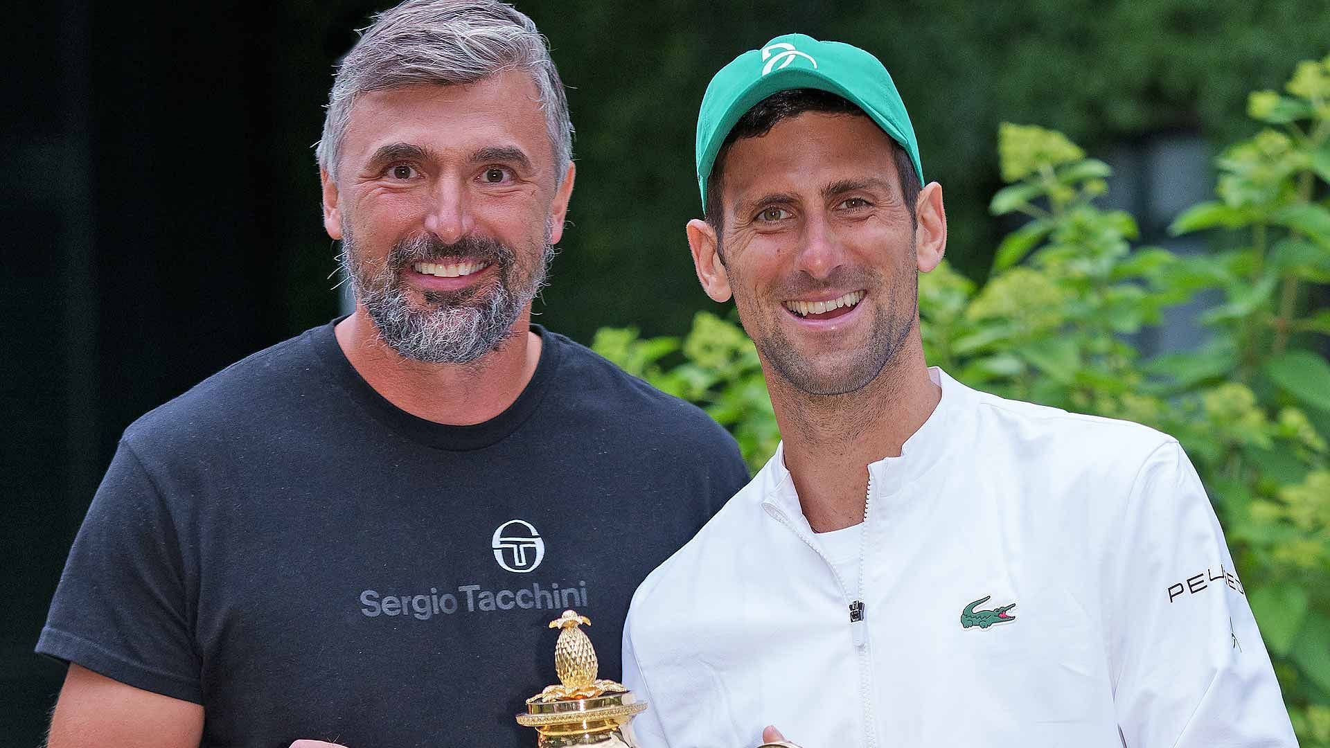 Former Wimbledon men&#039;s singles champion Goran Ivanisevic (L) with Novac Djokovic