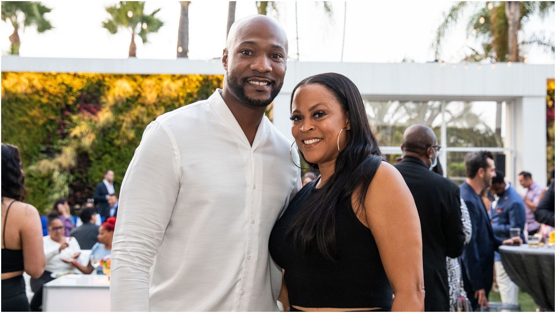 Keion Henderson and Shaunie O&#039;Neal pose at The Pump Group Soiree at The Beverly Hills Hotel on August 19, 2021, in Beverly Hills, California (Image via Getty Images)