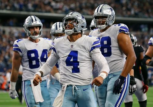 Dallas Cowboys players celebrate against the Atlanta Falcons