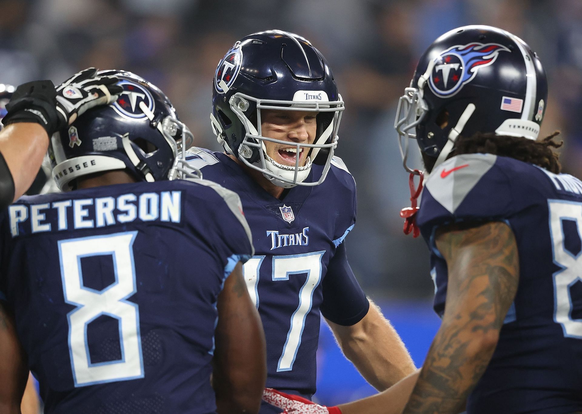 Ryan Tannehill (center) celebrates with teammates during the Titans win over the LA Rams last Sunday (Photo: Getty)