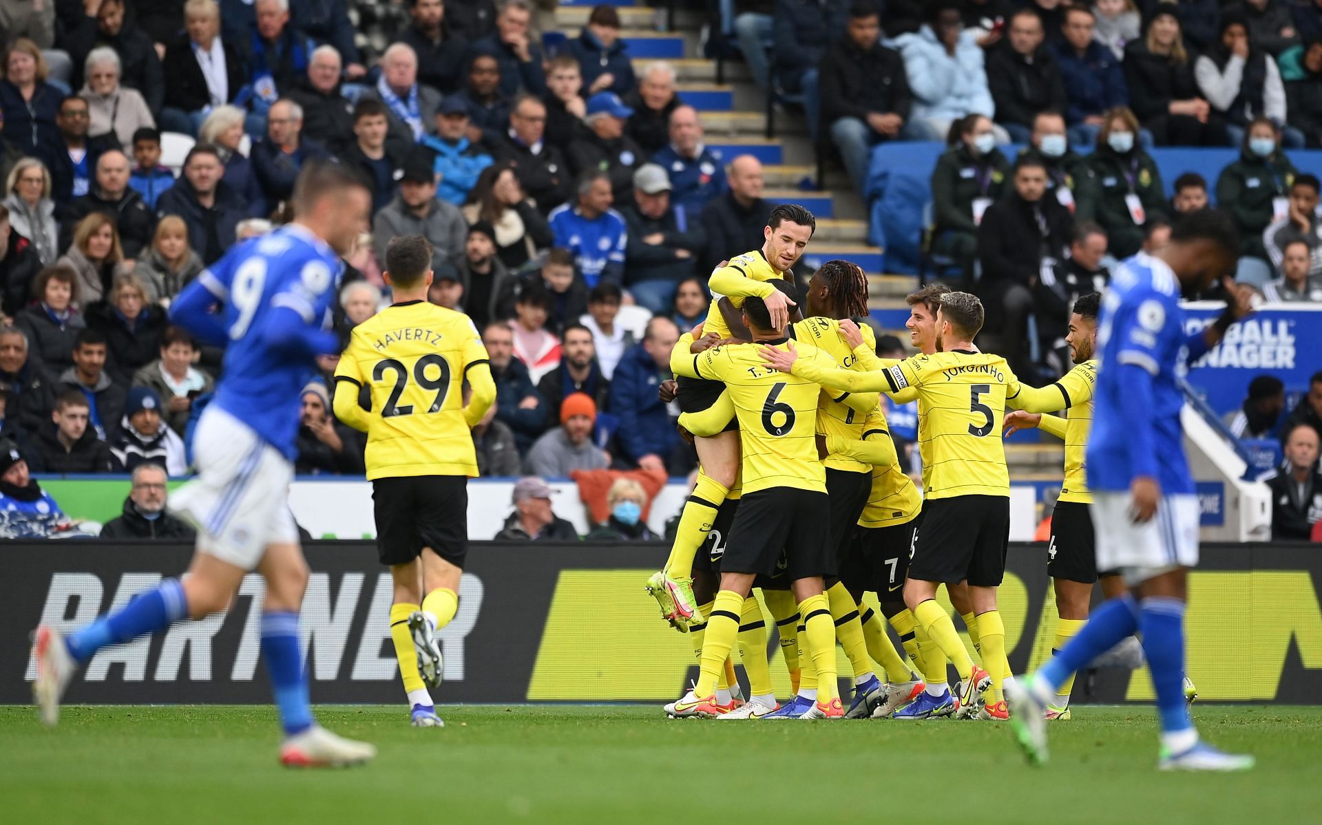 Antonio Rudiger celebrates with his teammates after scoring the first goal of the evening.