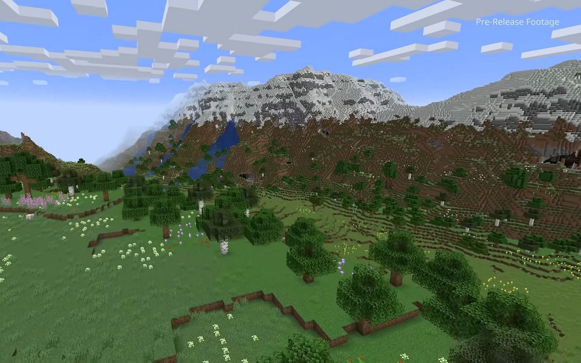 Tall mountains and deep caves were featured in the official trailer (Image via Minecraft)