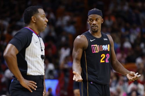 Jimmy Butler #22 of the Miami Heat argues with referee