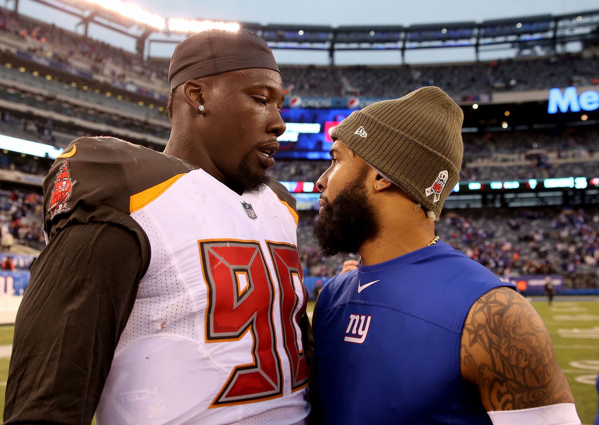 Beckham (R) talks with Jason Pierre-Paul following a 2018 showdown between the New York Giants and Tampa Bay Buccaneers