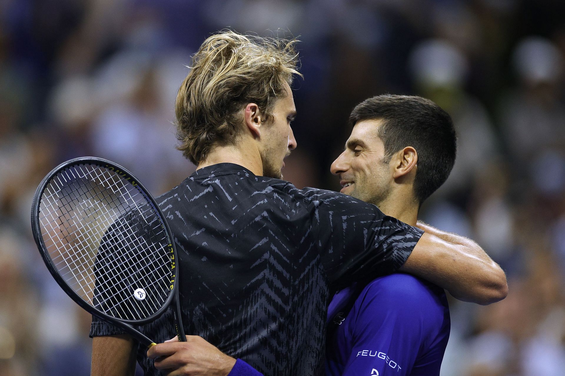 Alexander Zverev (L) and Novak Djokovic after their 2021 US Open semifinal