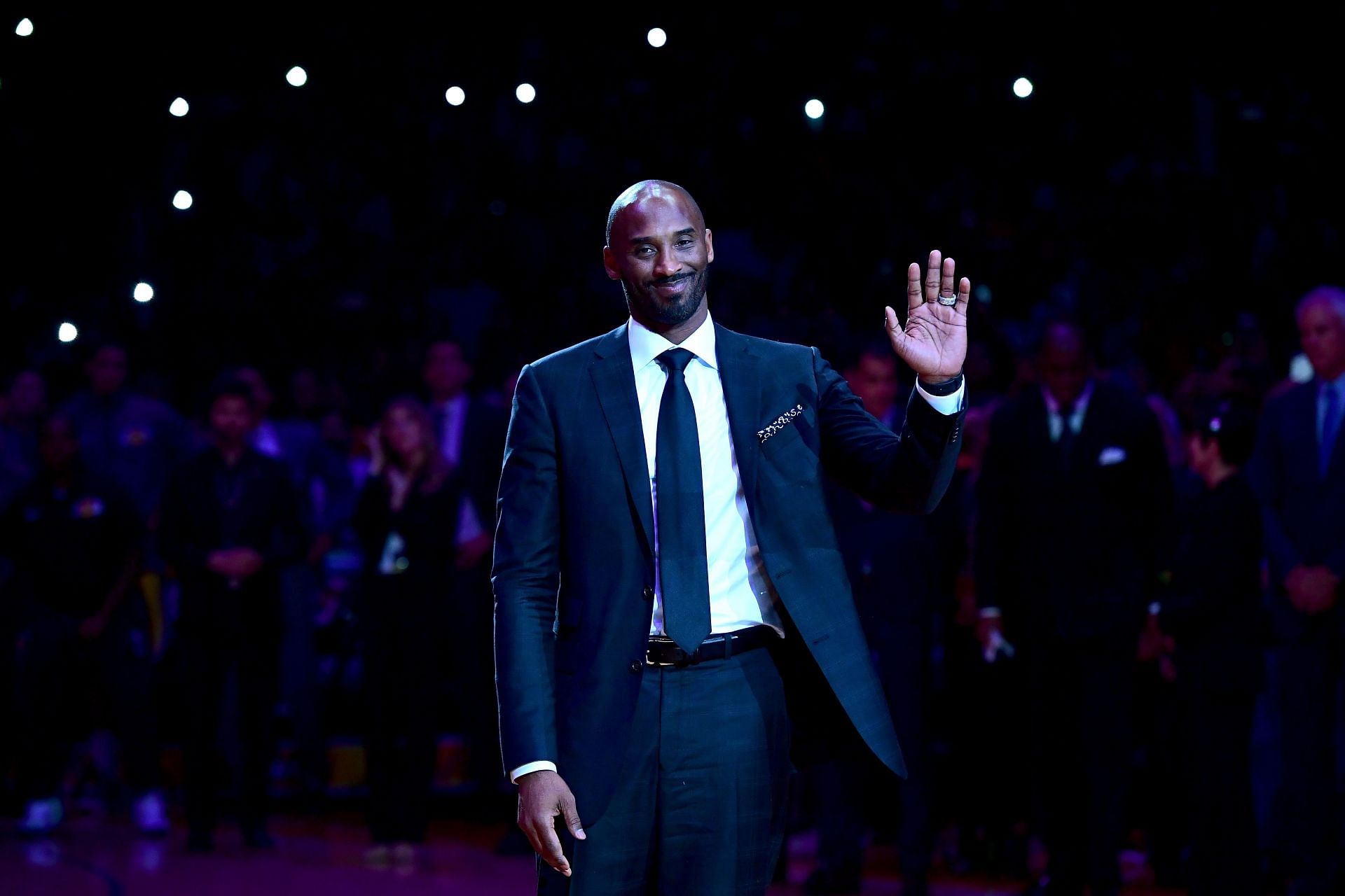 Kobe Bryant smiles at halftime as both his #8 and #24 Los Angeles Lakers jerseys are retired at Staples Center on December 18, 2017 in Los Angeles, California.