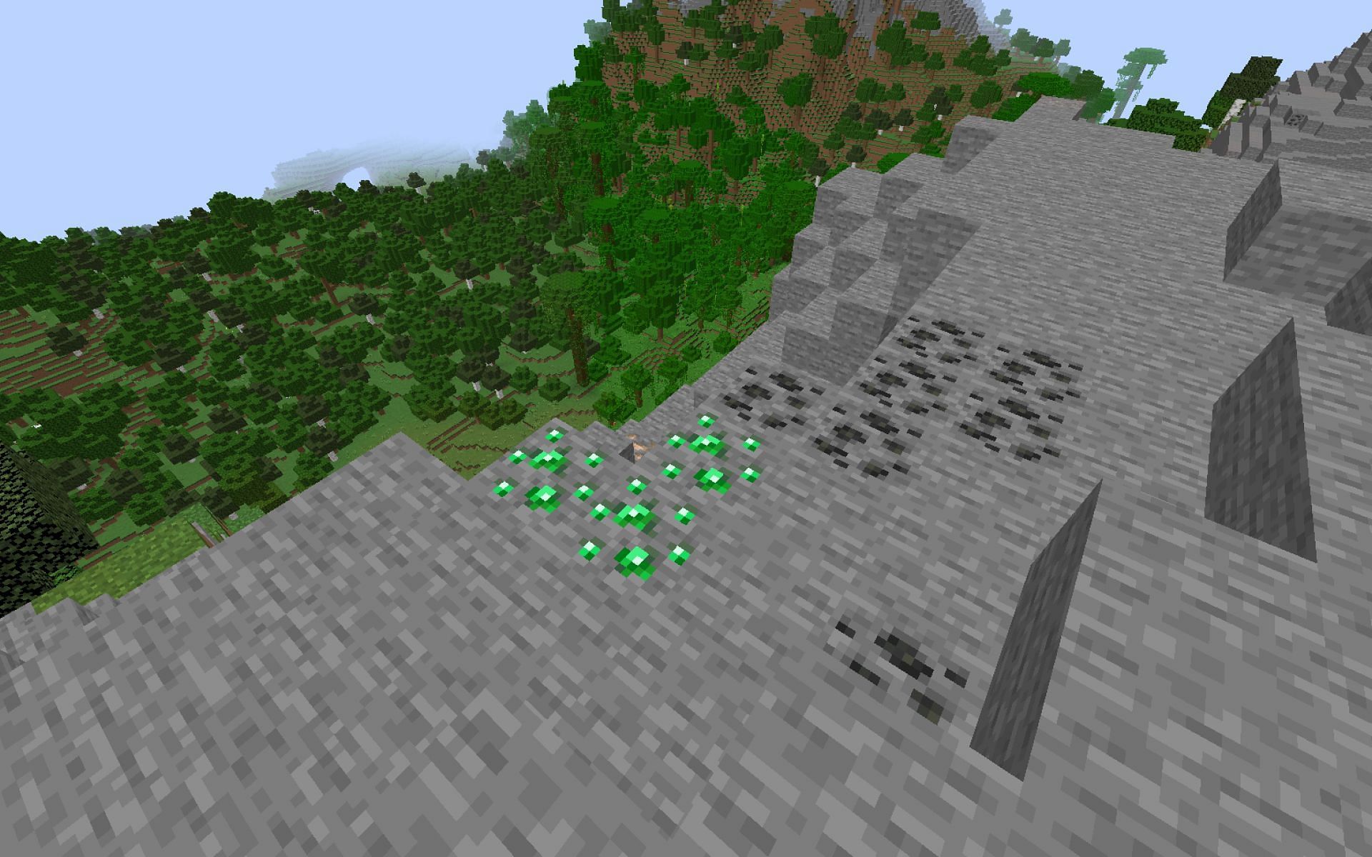 Several exposed emerald ore can be found in this world seed. (Image via Minecraft)