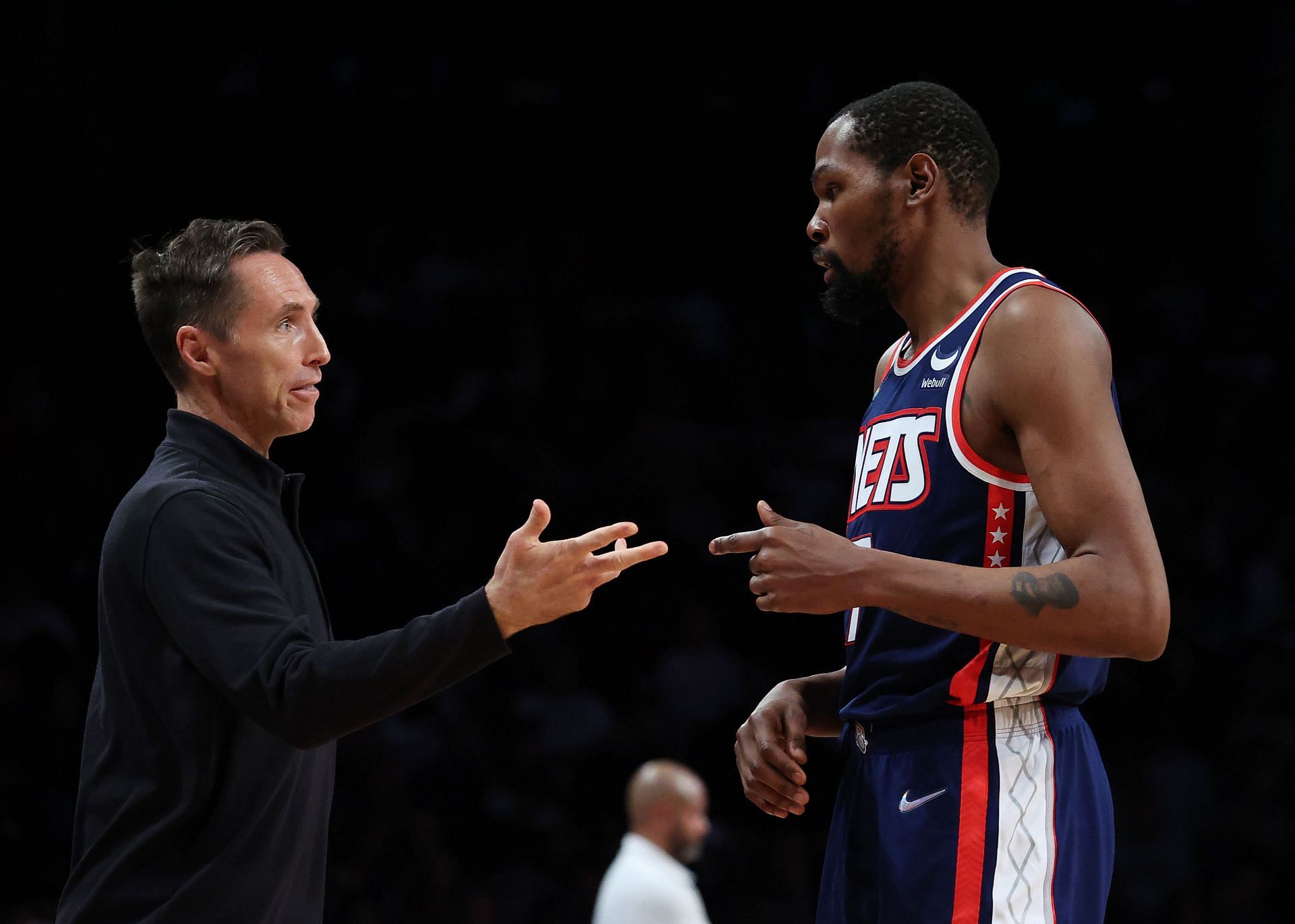 Head Coach Steve Nash and Kevin Durant #7 of the Brooklyn Nets talk during their game against the Cleveland Cavaliers at Barclays Center on November 17, 2021 in New York City.