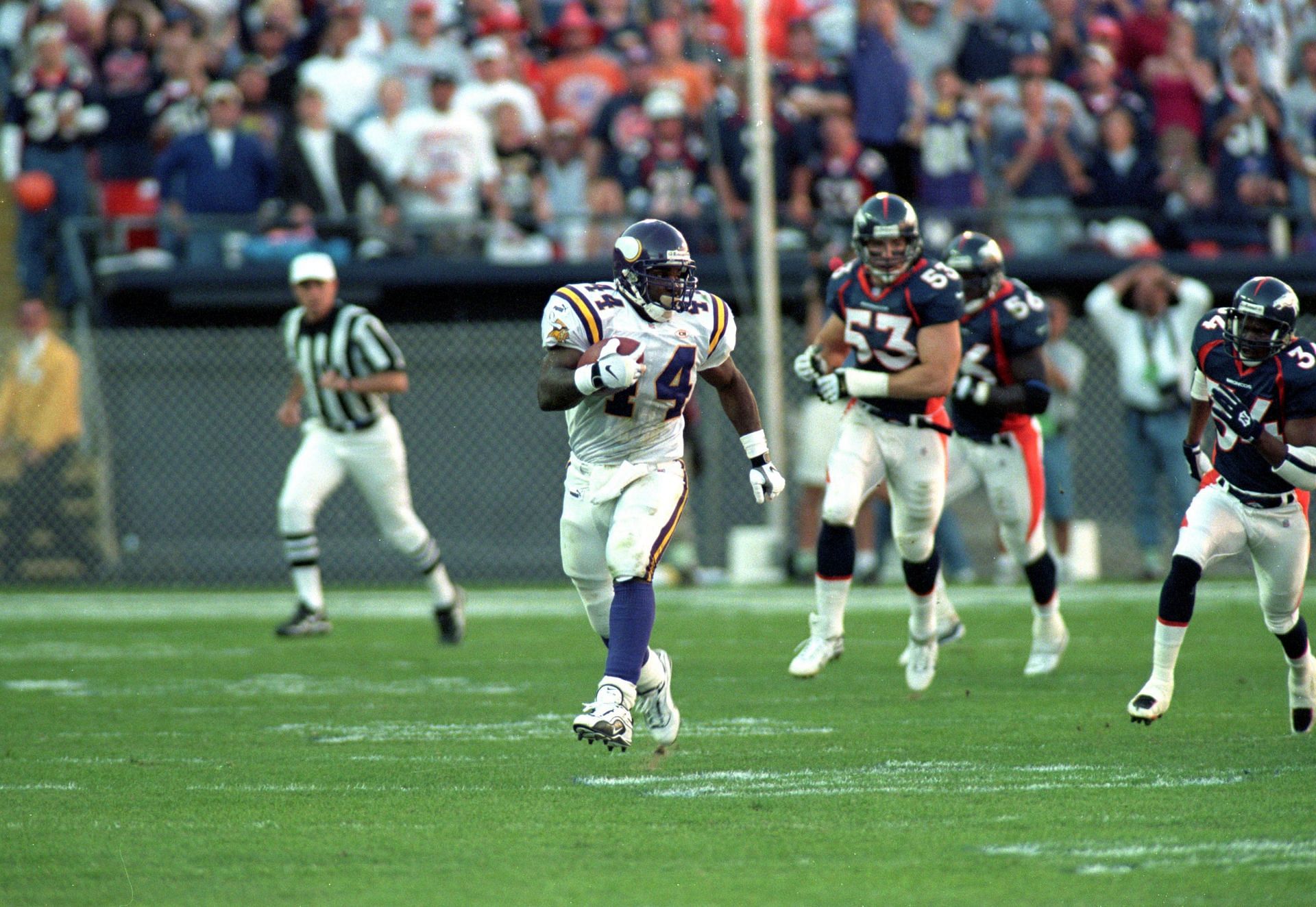 Hoard breaks loose for a big gain against Denver in 1999 (Photo: Getty)