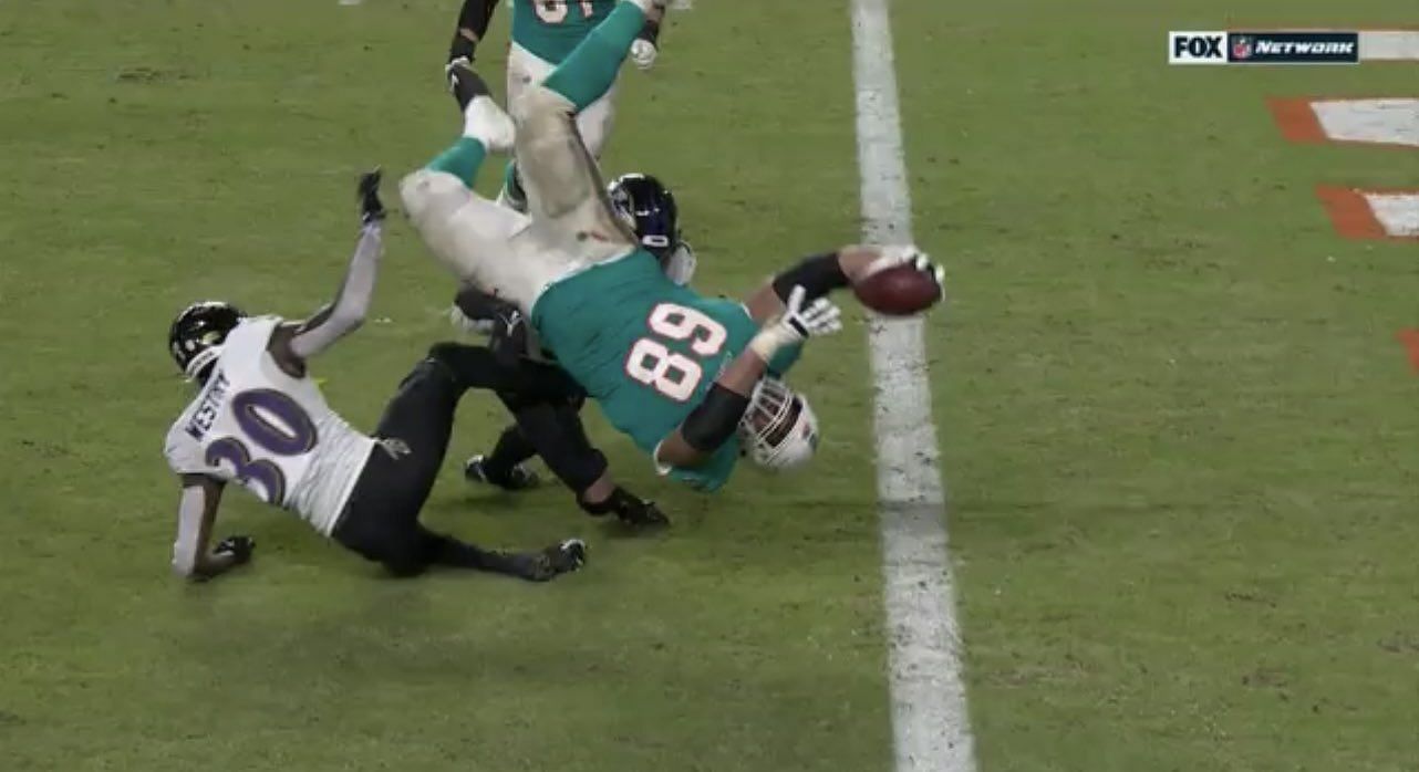 Robert Hunt somersaults for a touchdown that eventually gets nullified