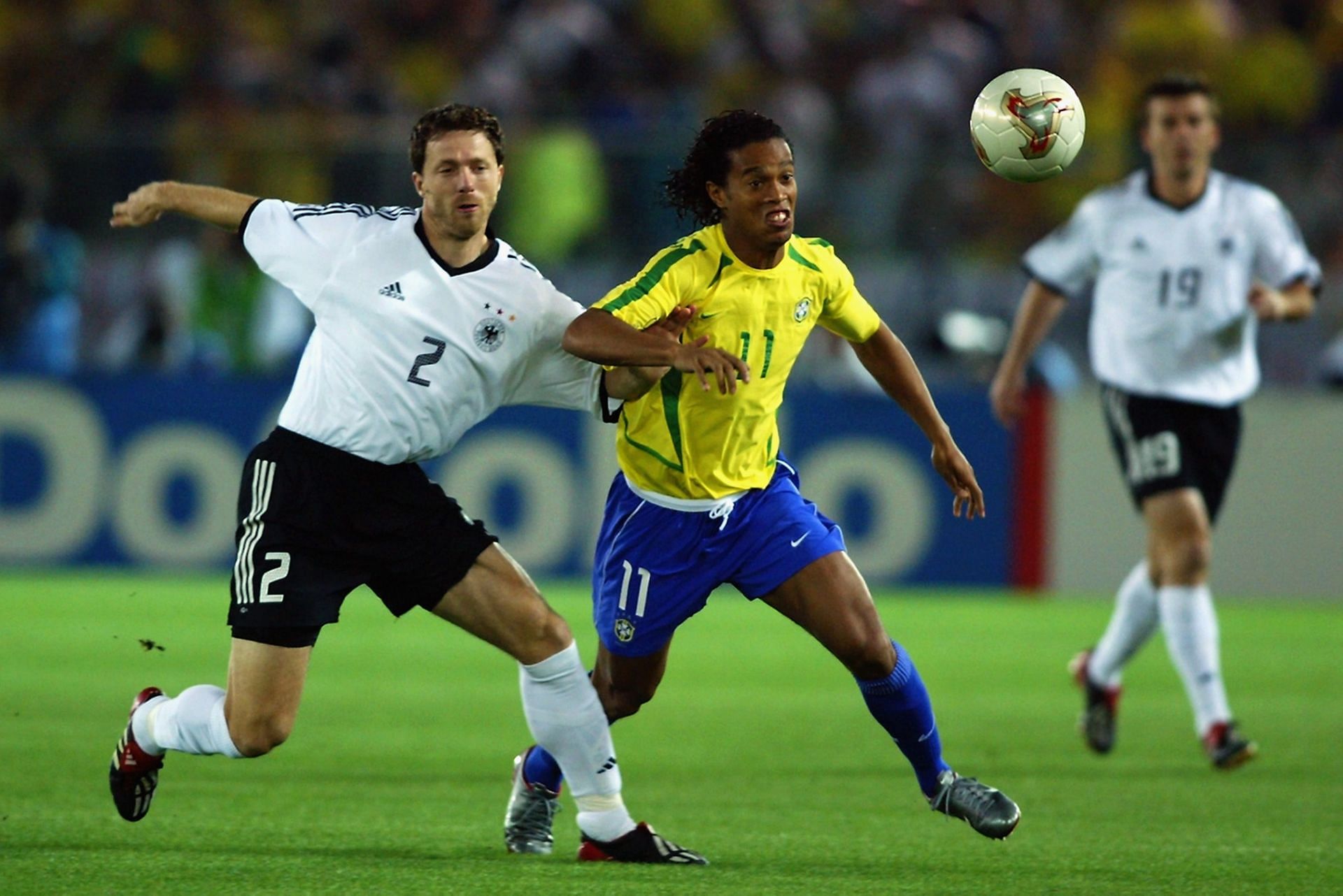 Ronaldinho of Brazil and Thomas Linke