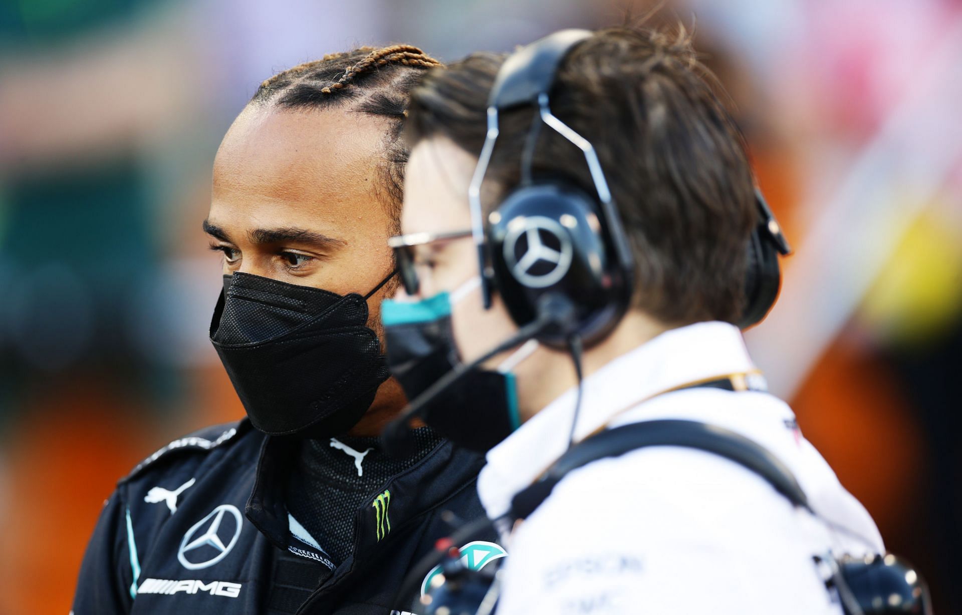 Lewis Hamilton talks with Mercedes senior race engineer Peter Bonnington on the grid.