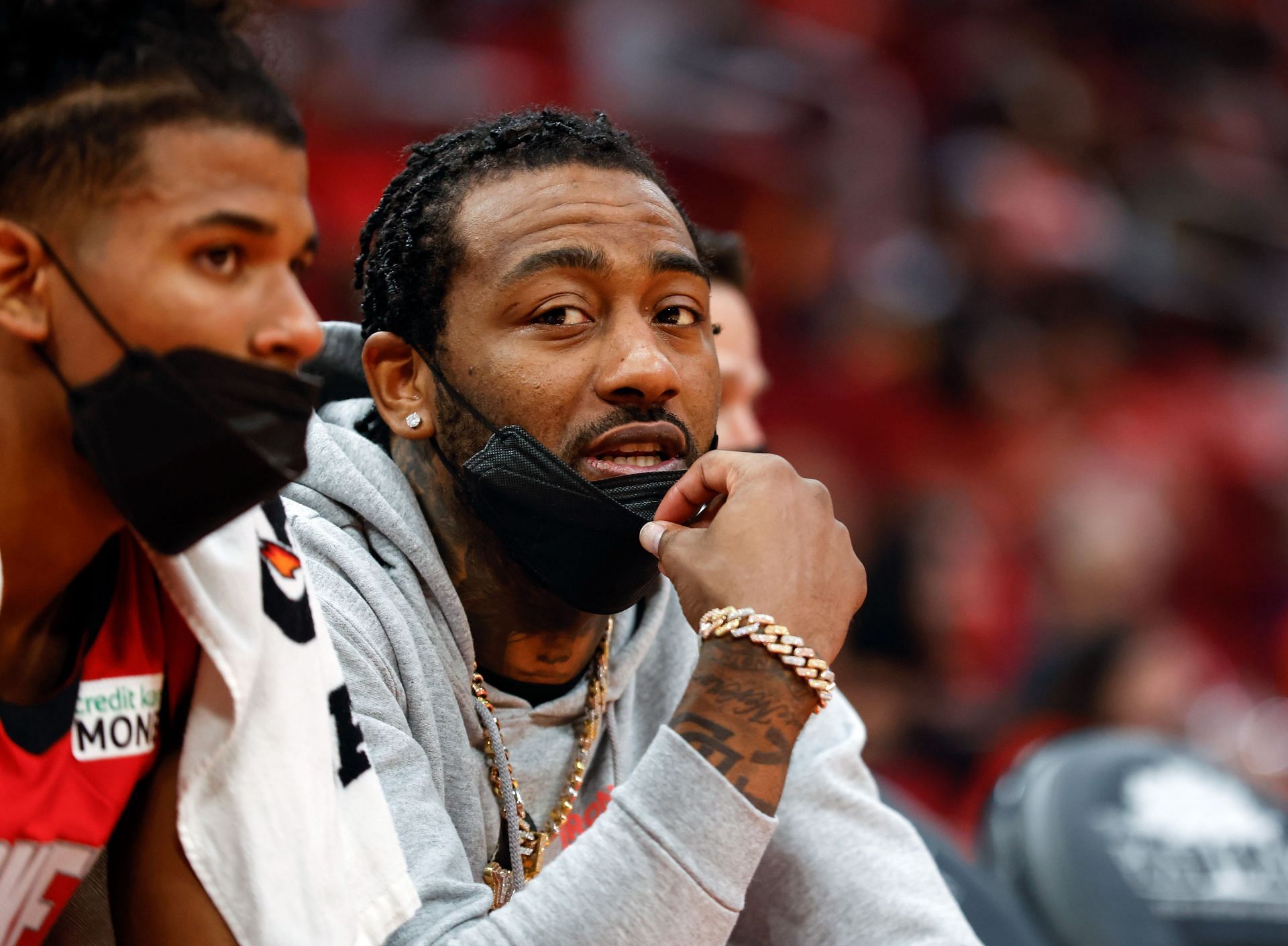 John Wall #1 of the Houston Rockets sits on the bench during the game against the Oklahoma City Thunder.