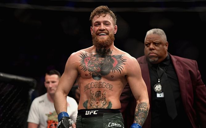 Watch: Conor McGregor spotted in Dubai and escorted by security as fans cheer him on