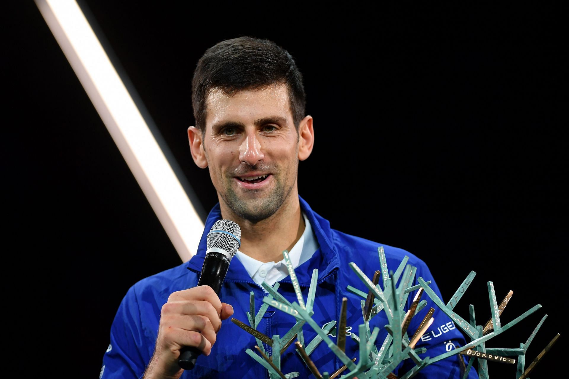 Novak Djokovic with his 2021 Rolex Paris Masters title