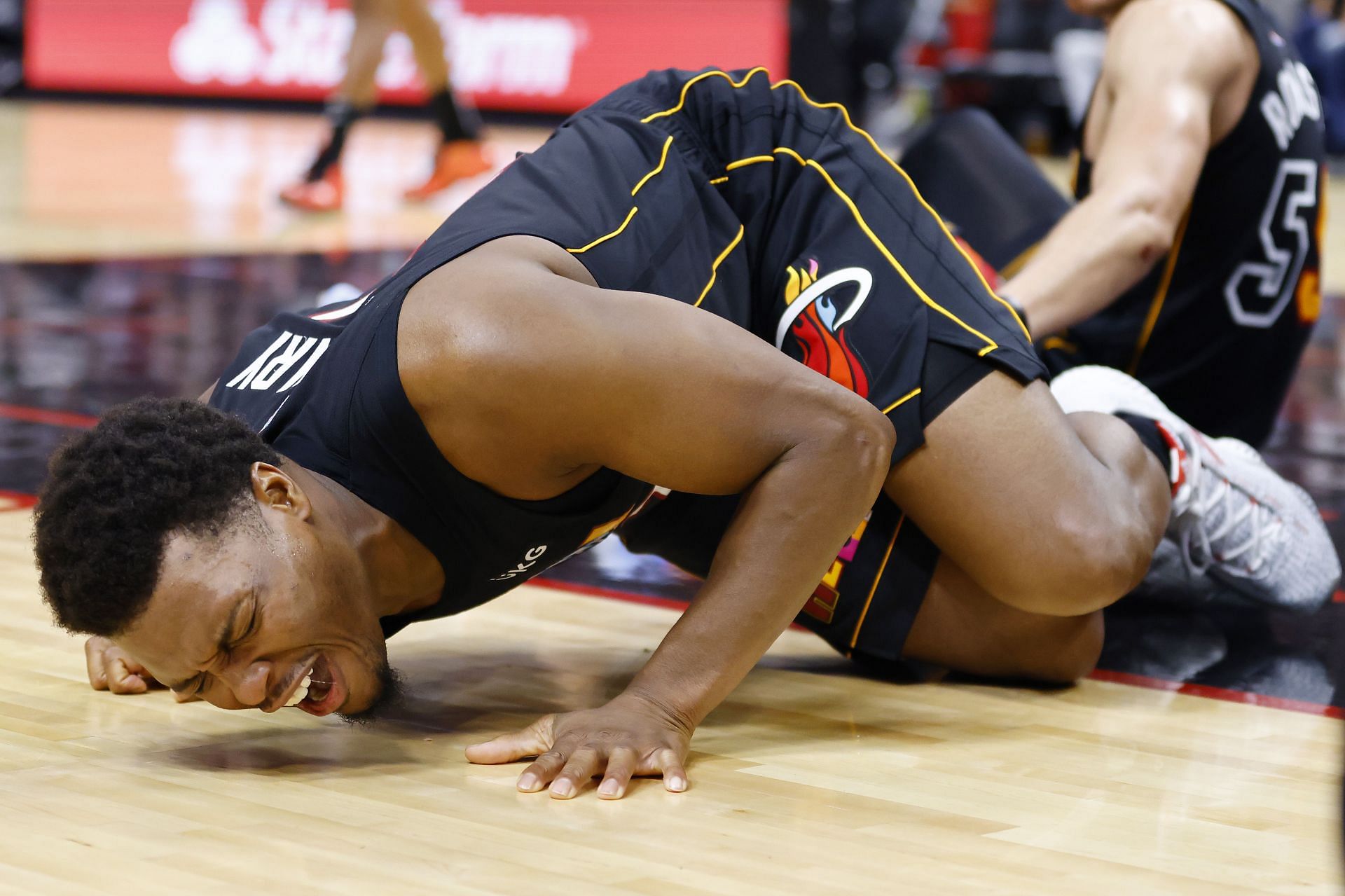 Kyle Lowry goes to the floor after an injury sustained during the Boston Celtics v Miami Heat game