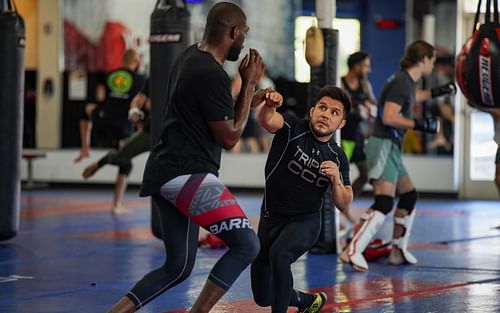 Jon Jones (left) & Henry Cejudo (right) [Image Credits- @HenryCejudo on Twitter]