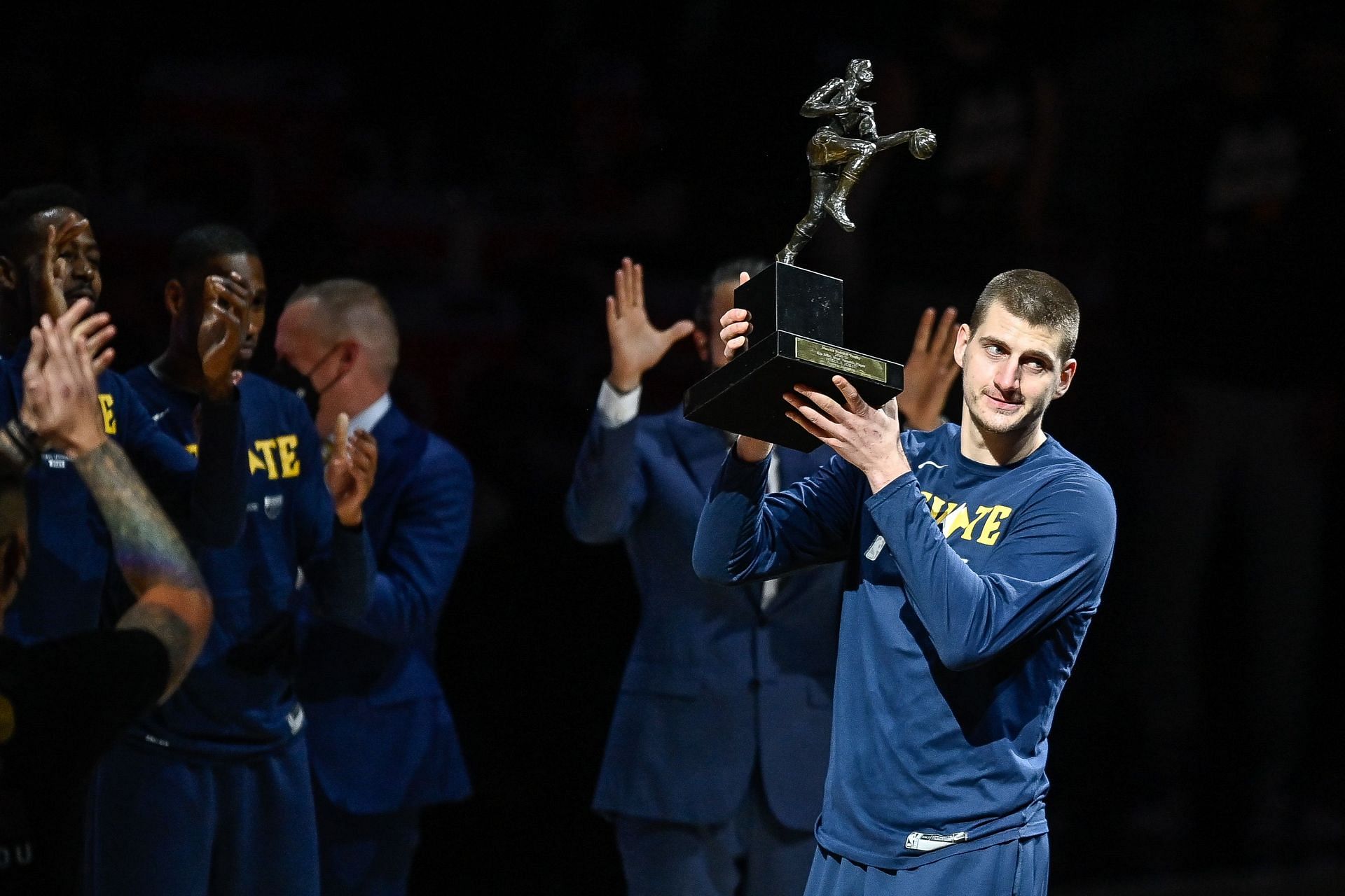 Nikola Jokic #15 of the Denver Nuggets accepts the 2021 NBA MVP award before Game Three of the Western Conference second-round playoff series at Ball Arena on June 11, 2021 in Denver, Colorado.