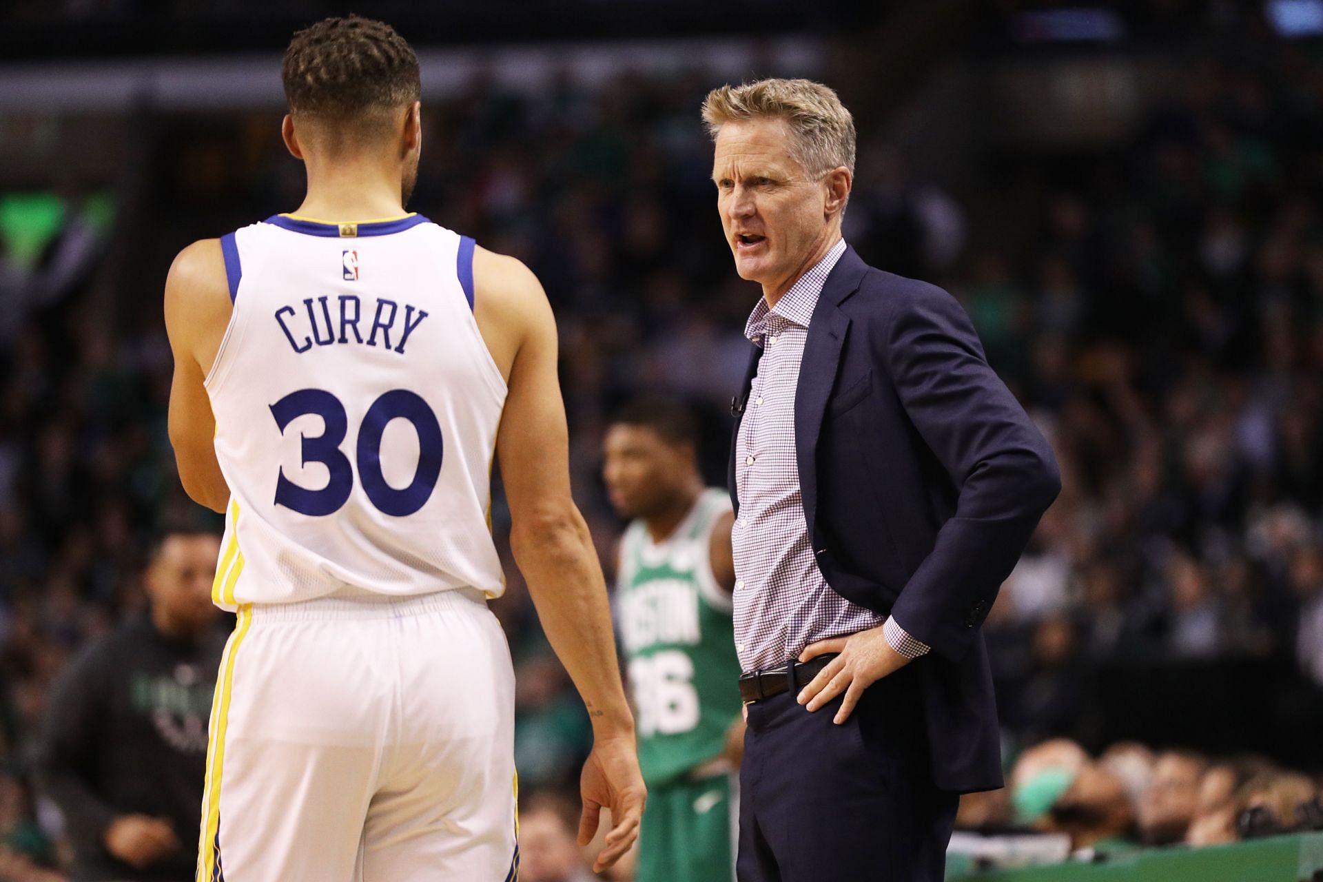 Head coach Steve Kerr and Stephen Curry of the Golden State Warriors