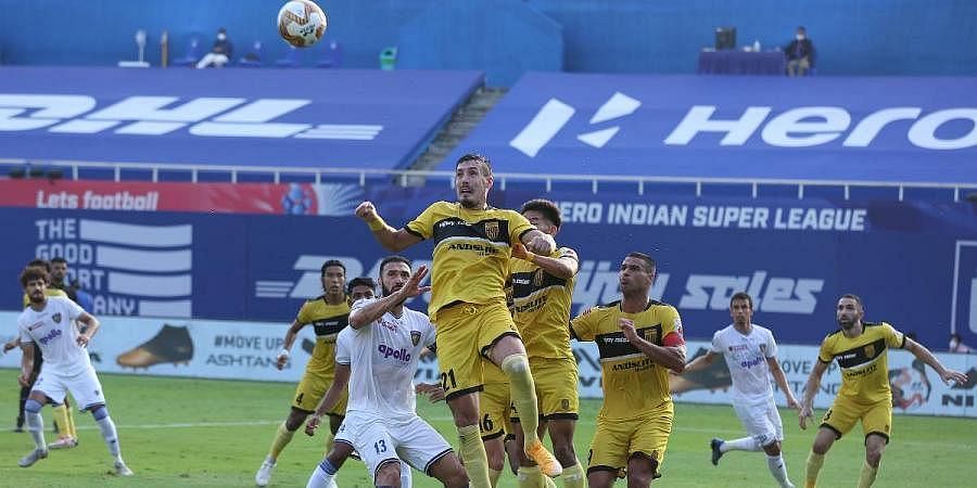 Hyderabad FC players (in yellow) in action in a previous season of ISL (Image courtesy: ISL Media)