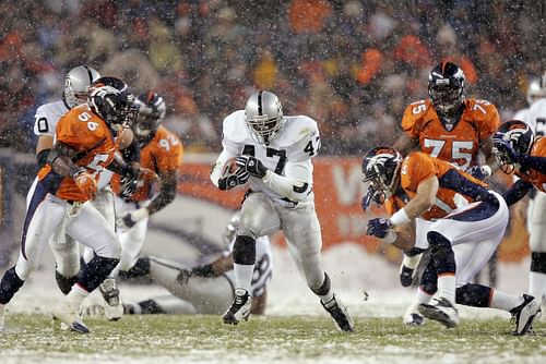 Tyrone Wheatley (in white) is the NFL's all-time leading rusher from Michigan (Photo: Getty)