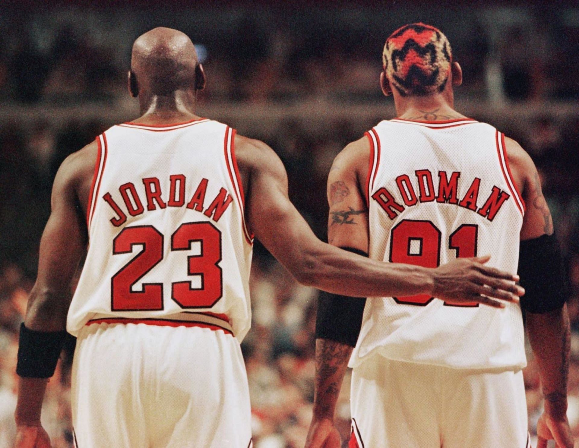 Chicago Bulls teammates Michael Jordan and Dennis Rodamn