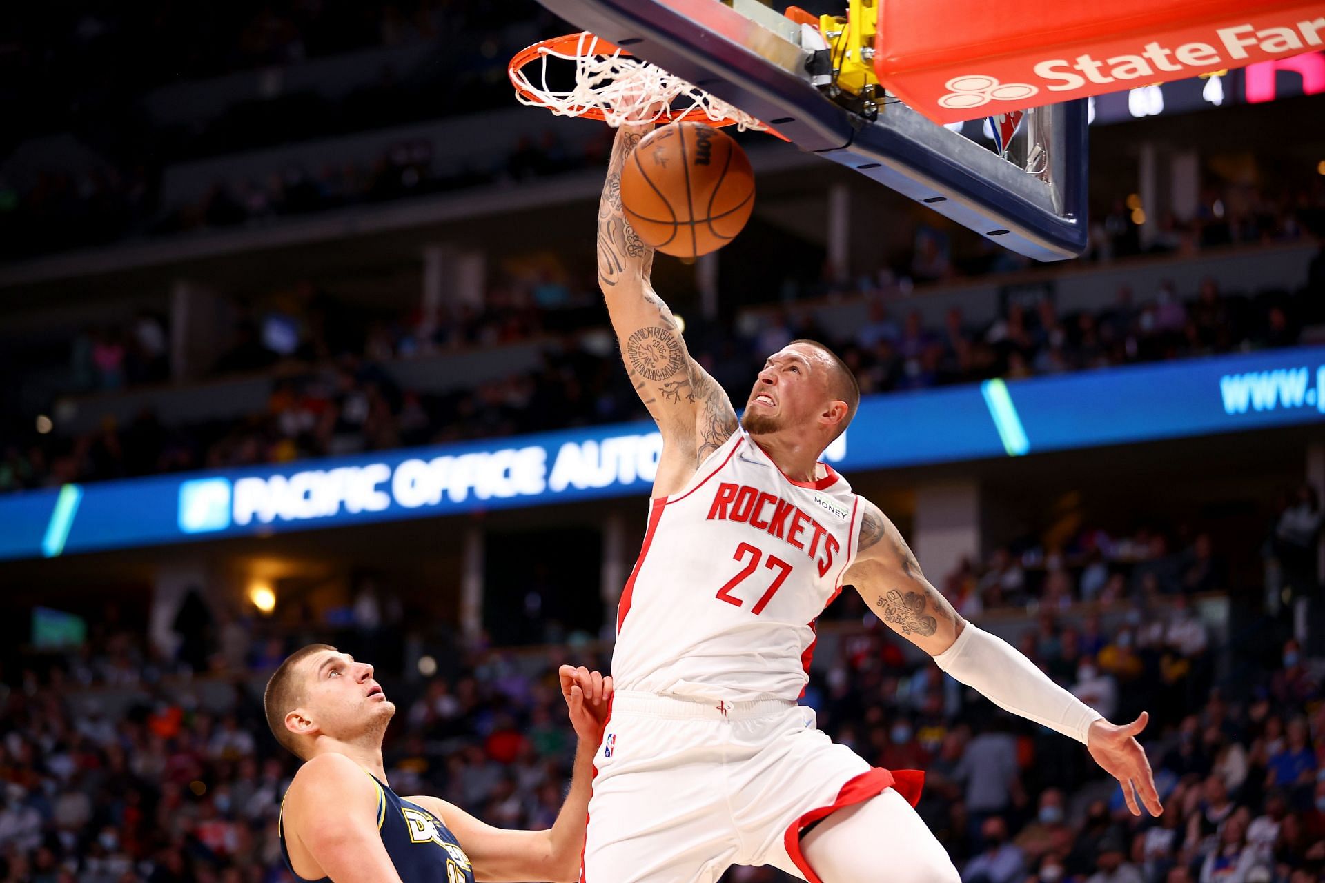 Daniel Theis dunks the ball in the Houston Rockets vs Denver Nuggets game.