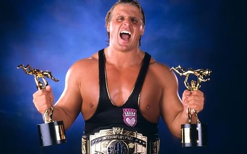 Owen Hart as the reigning Intercontinental Champion and two-time Slammy winner in WWE