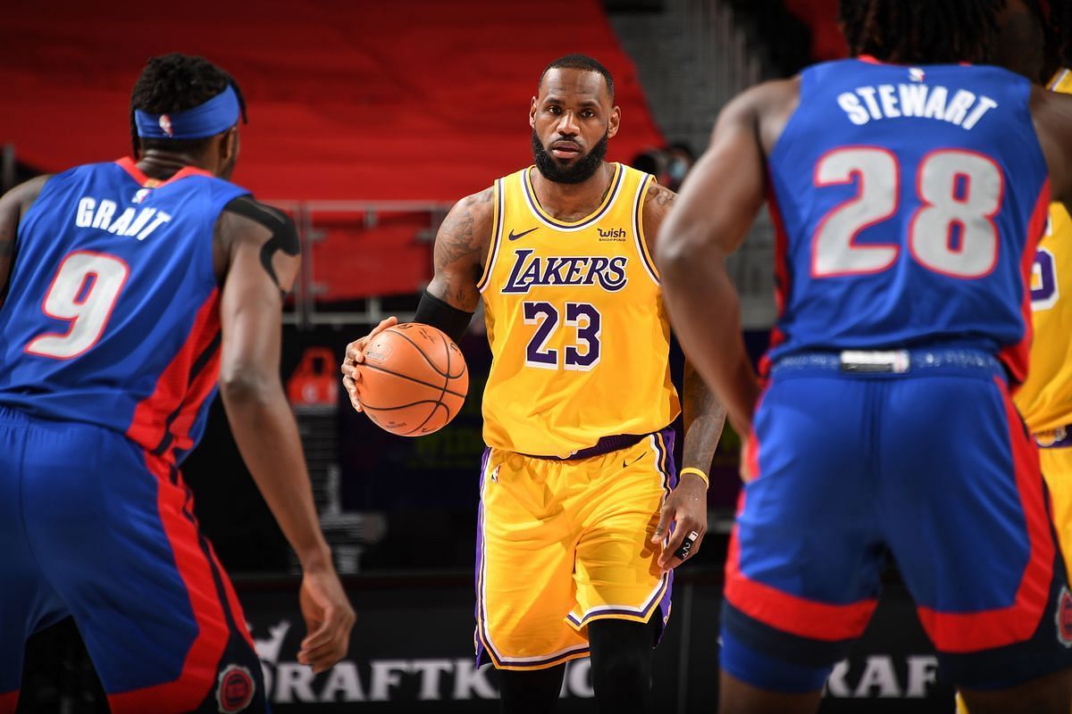 Detroit Pistons&#039; Isaiah Stewart and Jerami Grant guarding LeBron James of the LA Lakers