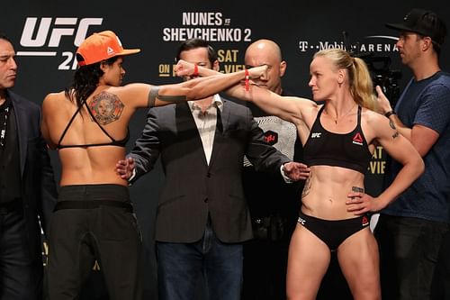 Amanda Nunes (left) and Valentina Shevchenko (right) at the UFC 215: Weigh-ins