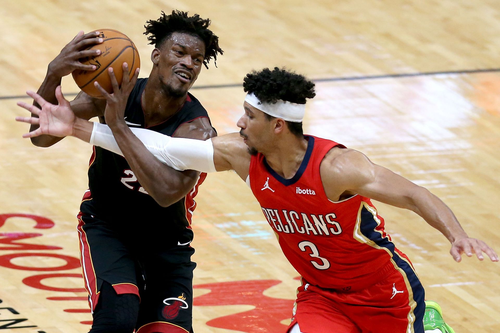 Jimmy Butler of the Miami Heat and Josh Hart of the New Orleans Pelicans.