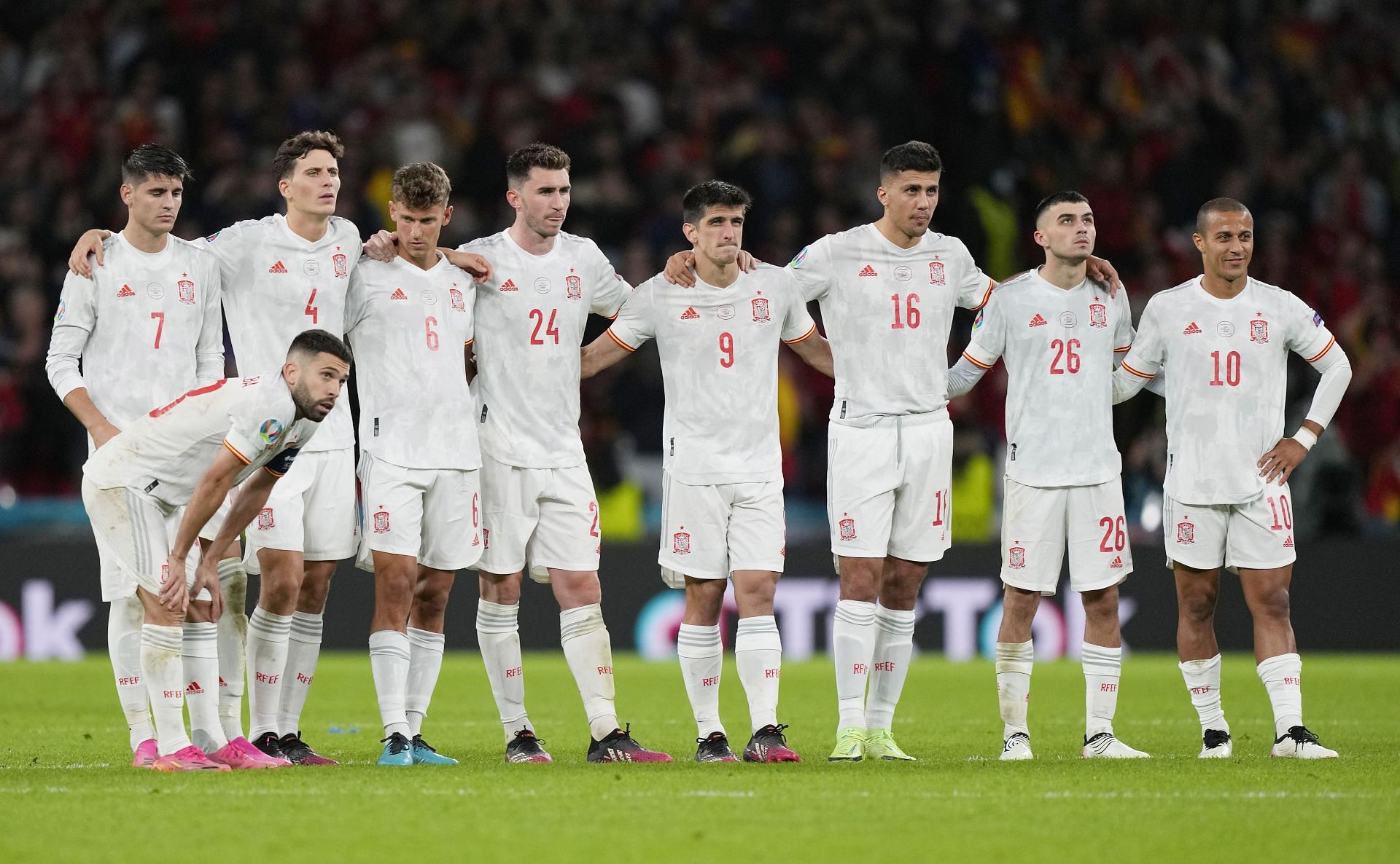 Spain watch on during their Euro 2020 penalty shootout defeat to Italy