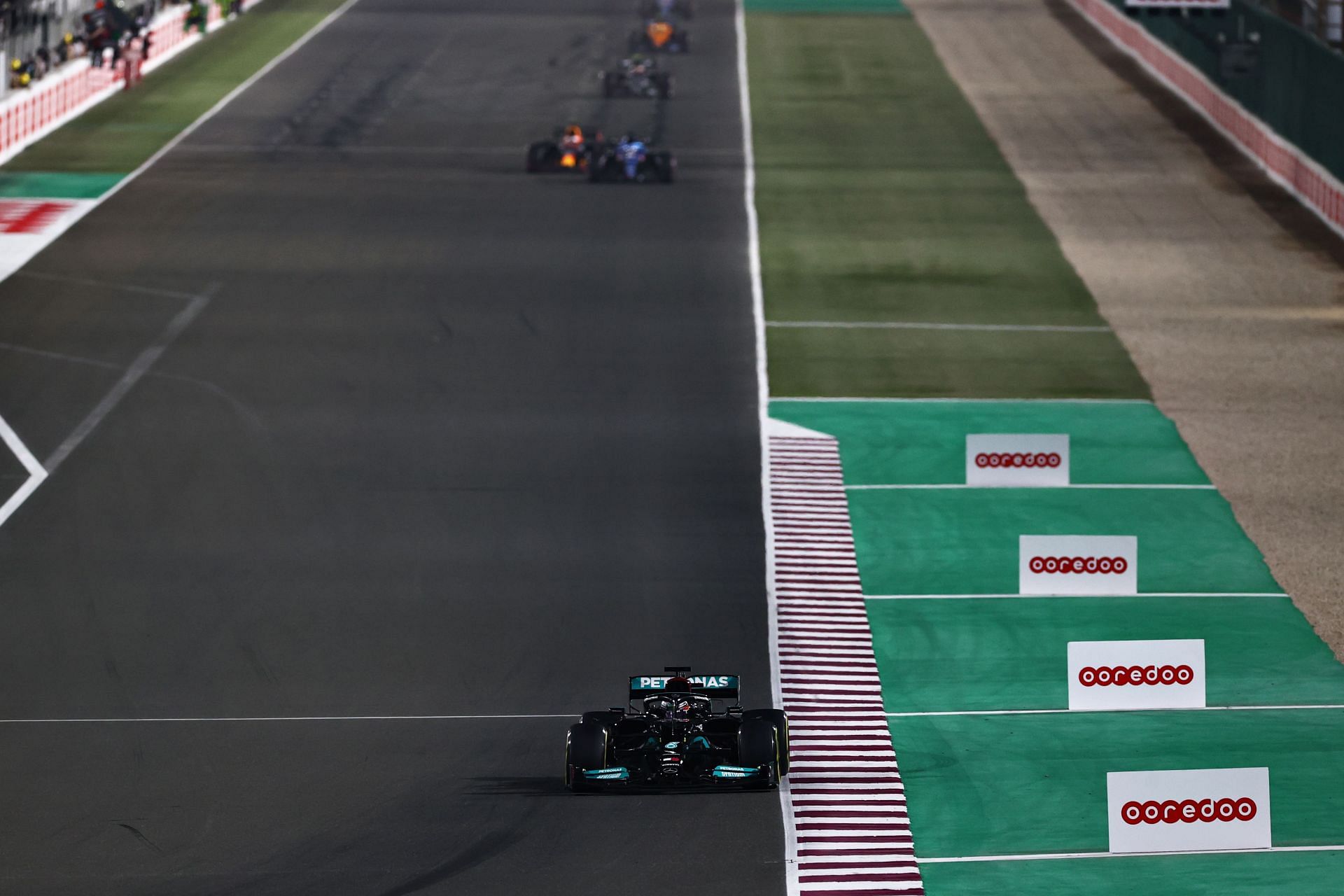 F1 Grand Prix of Qatar - Lewis Hamilton at the front of the pack.