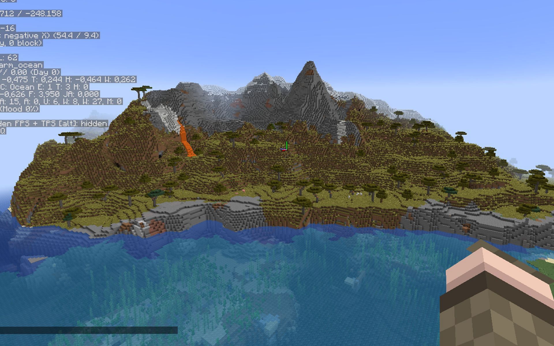 A screenshot of an ocean and mountains in Minecraft (Image via u/Yggdrassil_2 on Reddit)