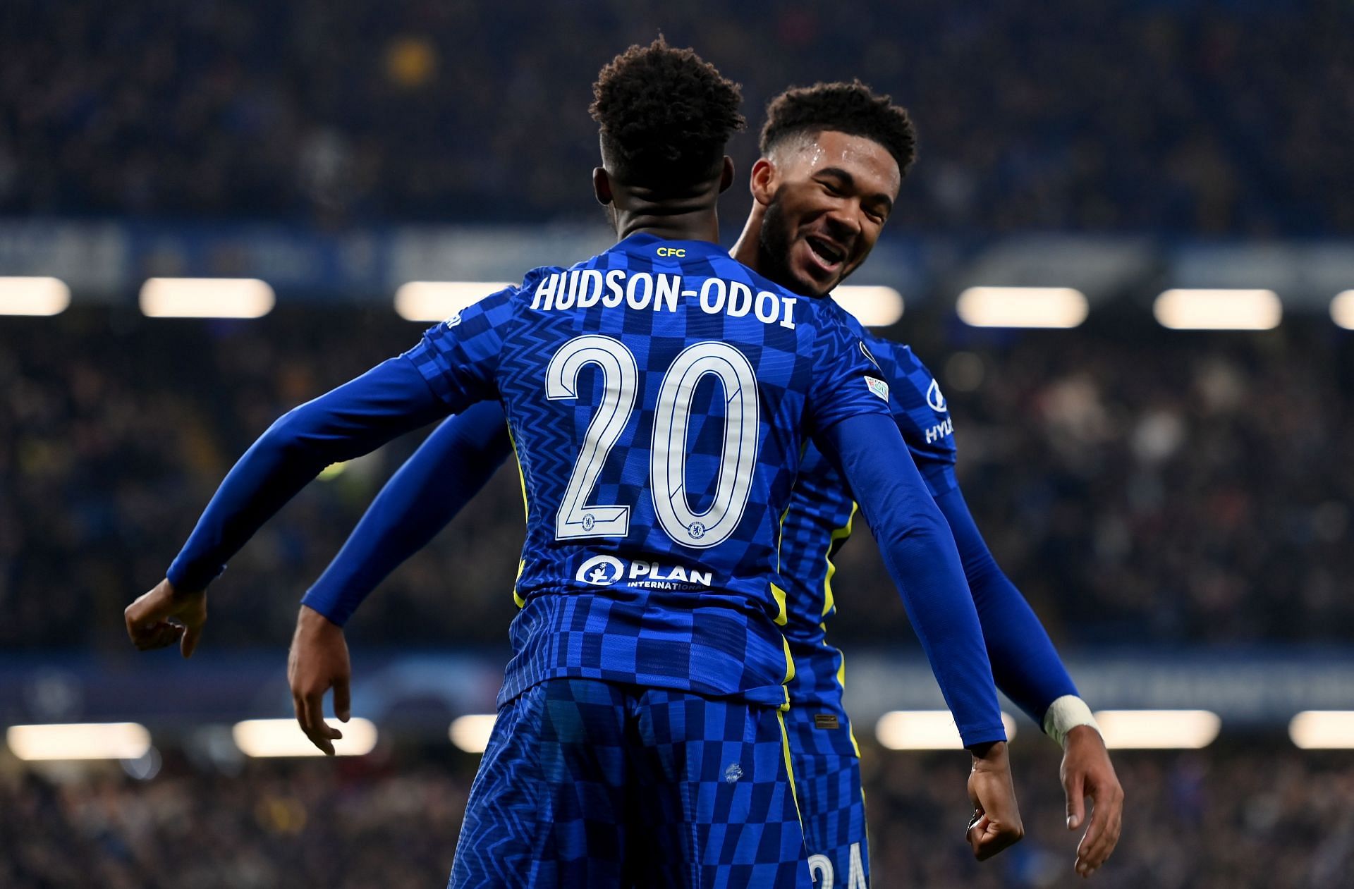 Chelsea winger Callum Hudson-Odoi celebrates with Reece James after scoring his side&#039;s third goal.
