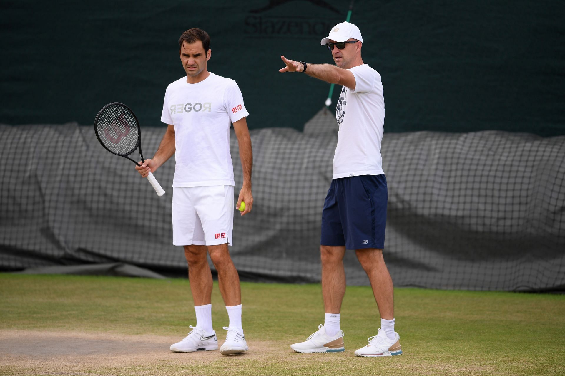Roger Federer with coach Ivan Ljubicic at Wimbledon in 2019
