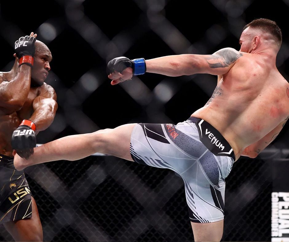 Colby Covington tries to land a kick on Kamaru Usman at UFC 268